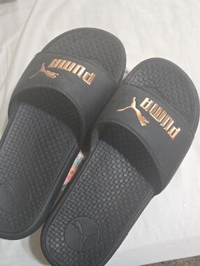 Puma Black Slides with Rose Gold Logo Accents